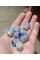 Nipple caps, luminescent, glow blue in the dark.